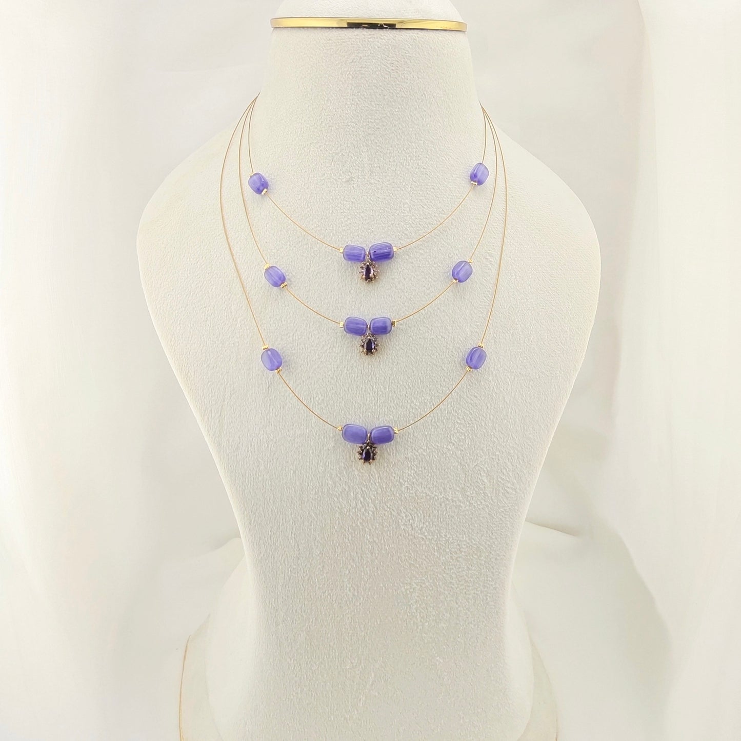 Three layered purple beaded invisible chain