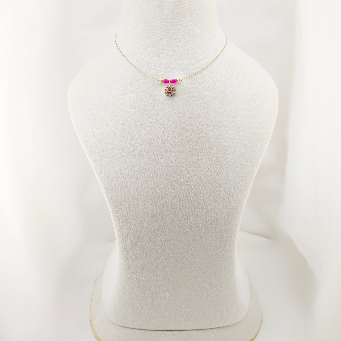 Ruby beaded oval pendant invisible chain