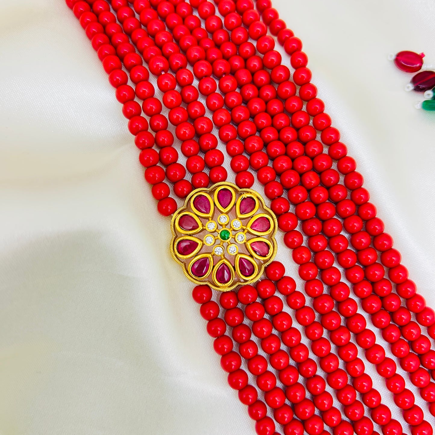 FIVE LAYER CORAL HAARA WITH SIDE PENDANT – CHANDBALI EARRINGS SET