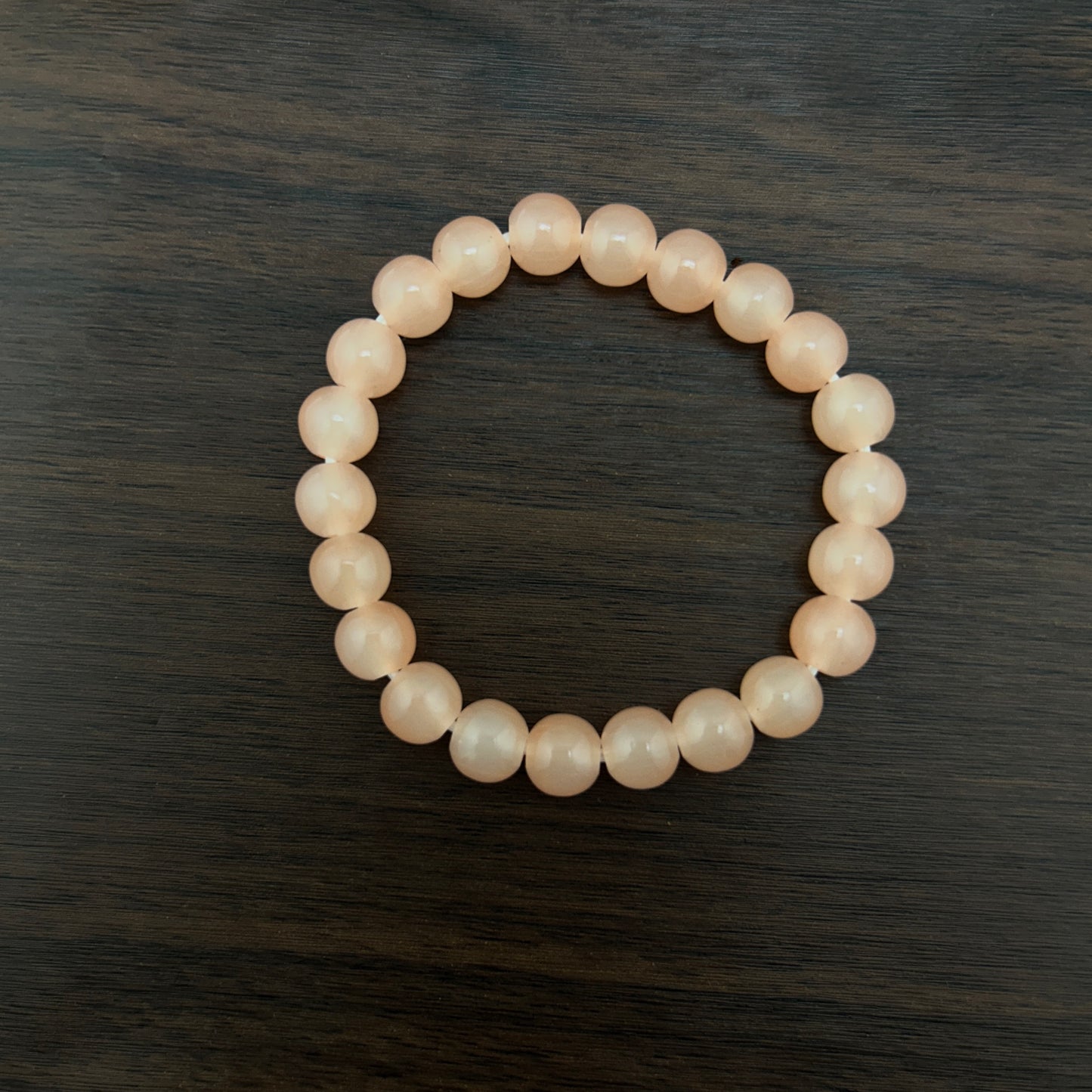 Round and smooth peach crystal bracelet
