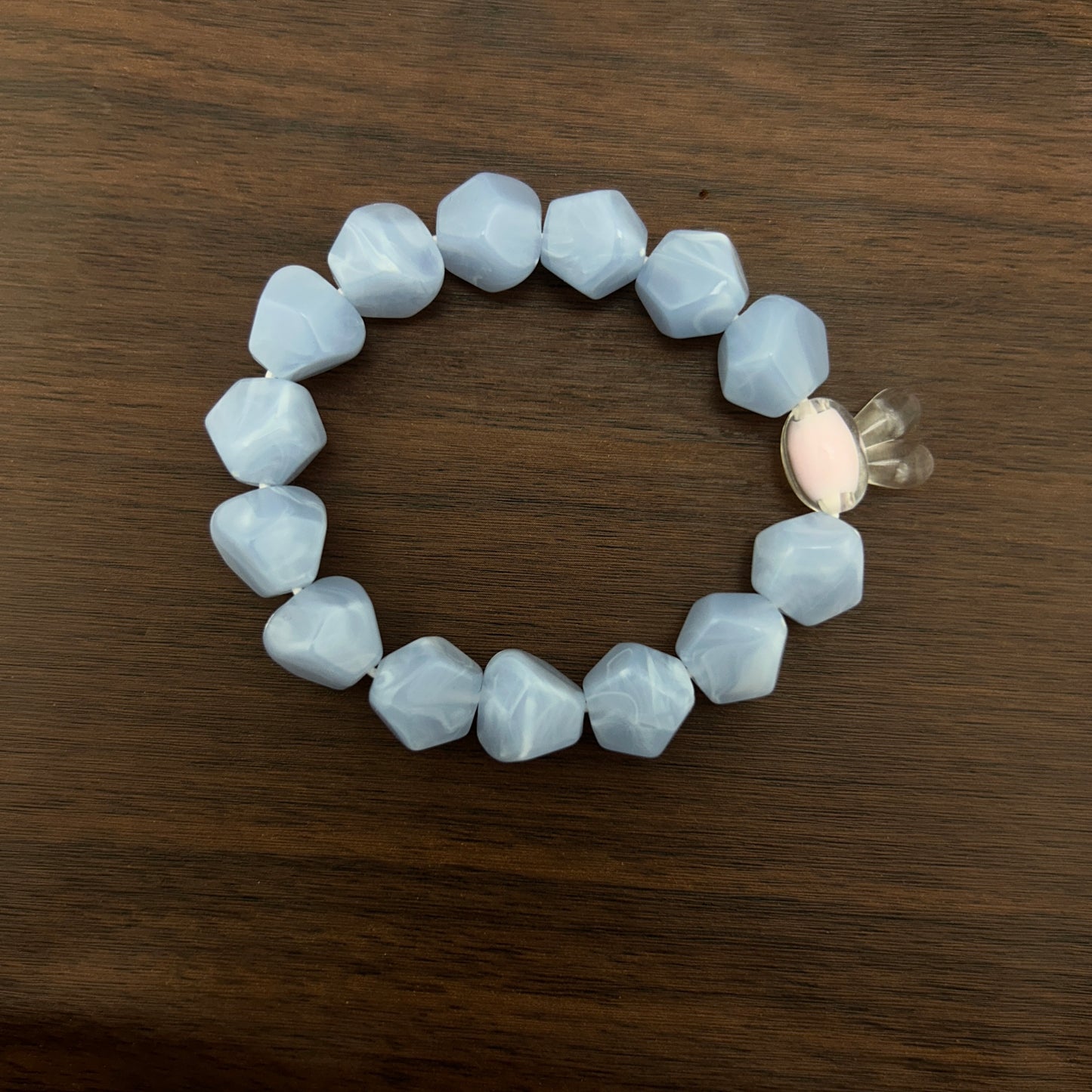 Blue beaded bracelet with a contrast bunny bead