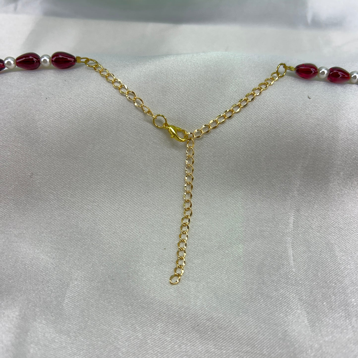 Pearl and maroon beaded Lakshmi long necklace with earrings