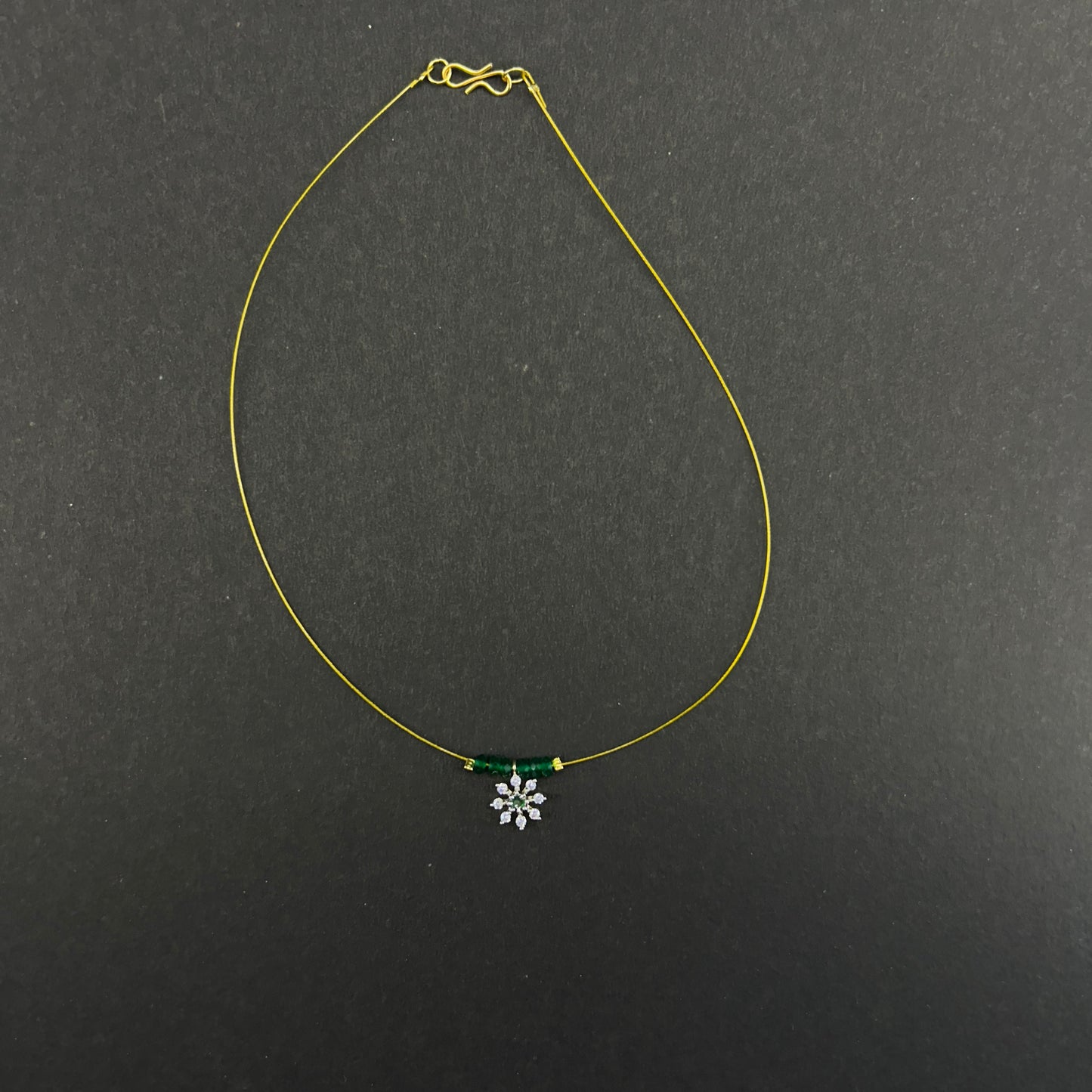Flower pendant with green beads invisible chain