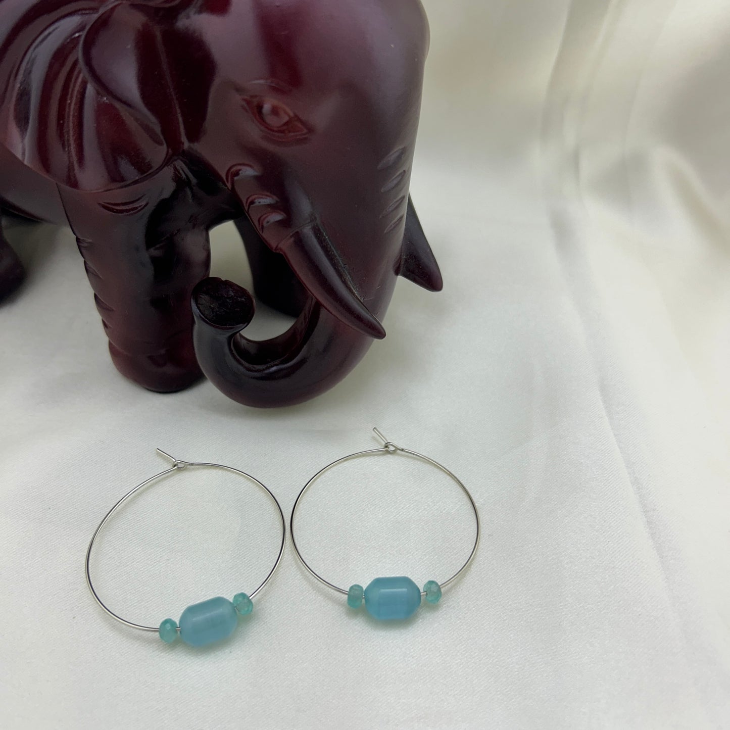 Blue cat eye beaded hoops
