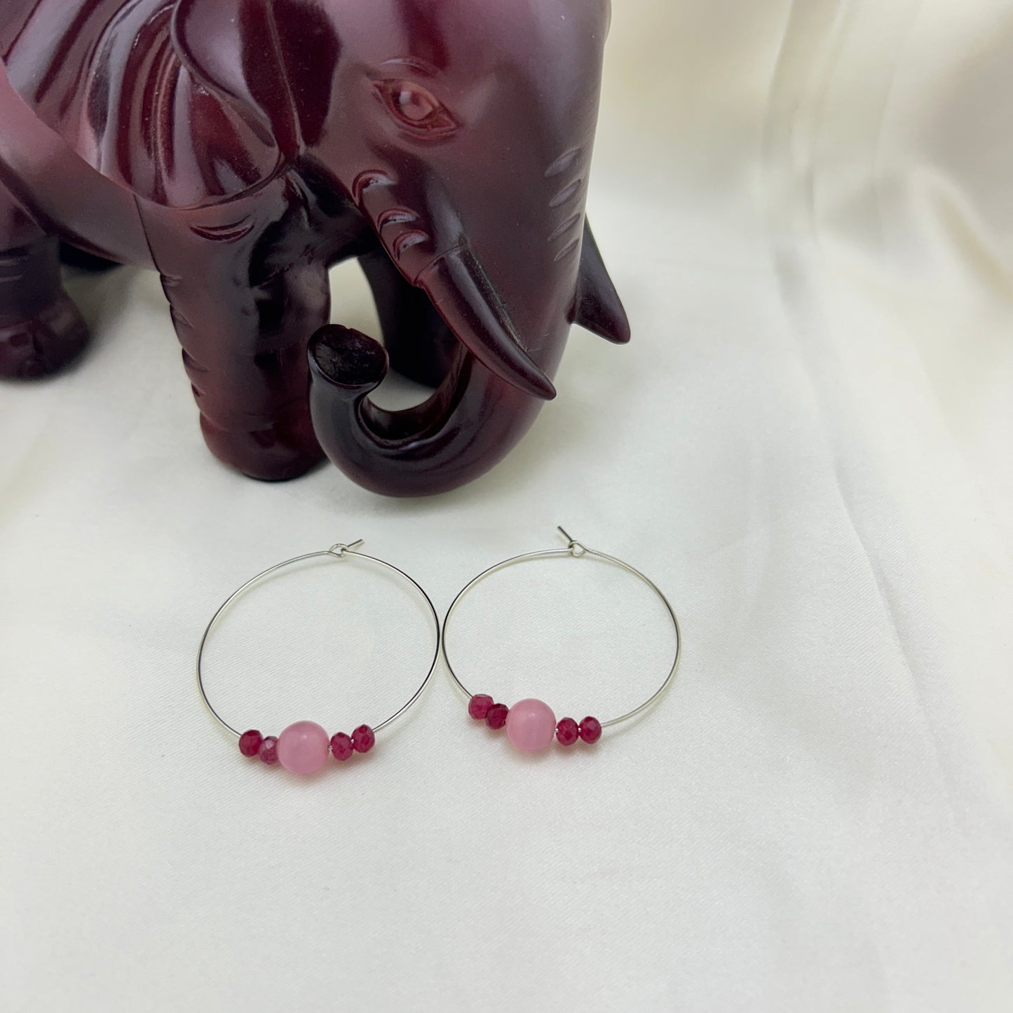 Pink cat eye beaded hoops