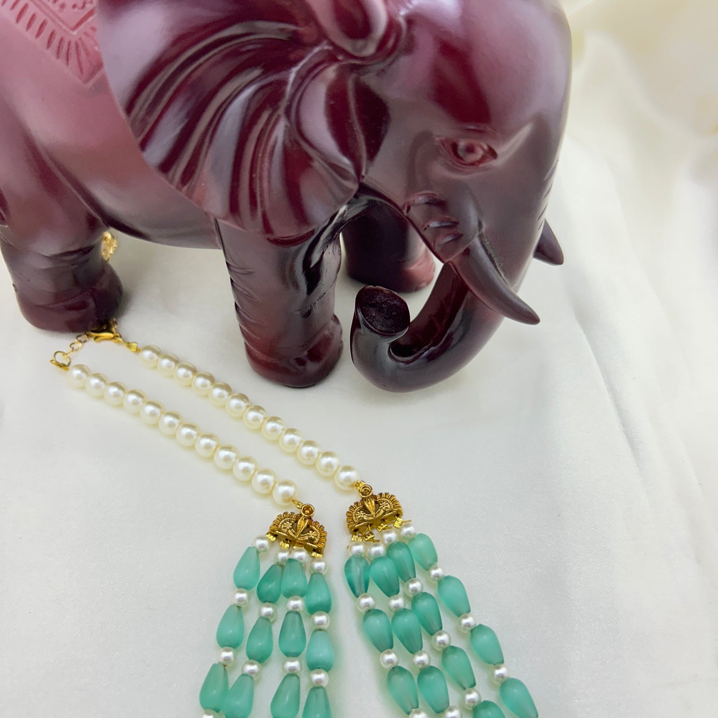 Light turquoise 4-layered Monalisa beaded necklace