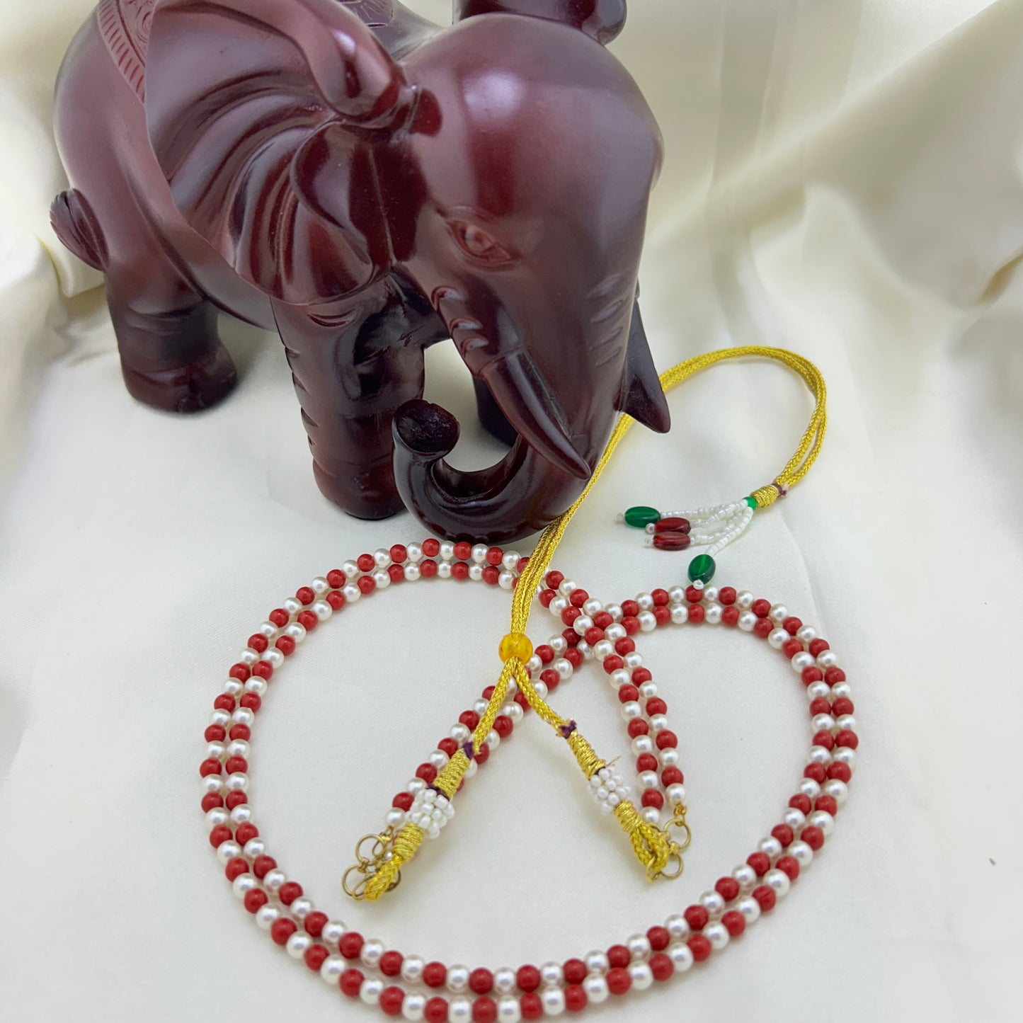 Two layered pearl and coral beaded necklace