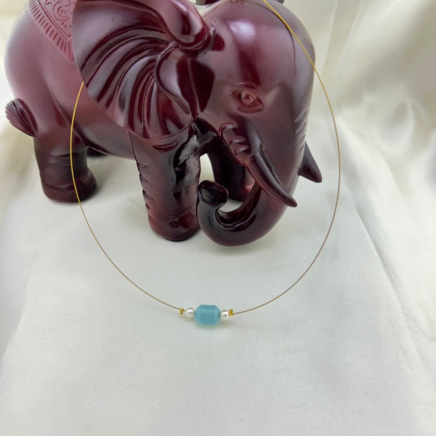 Light blue beaded invisible chain