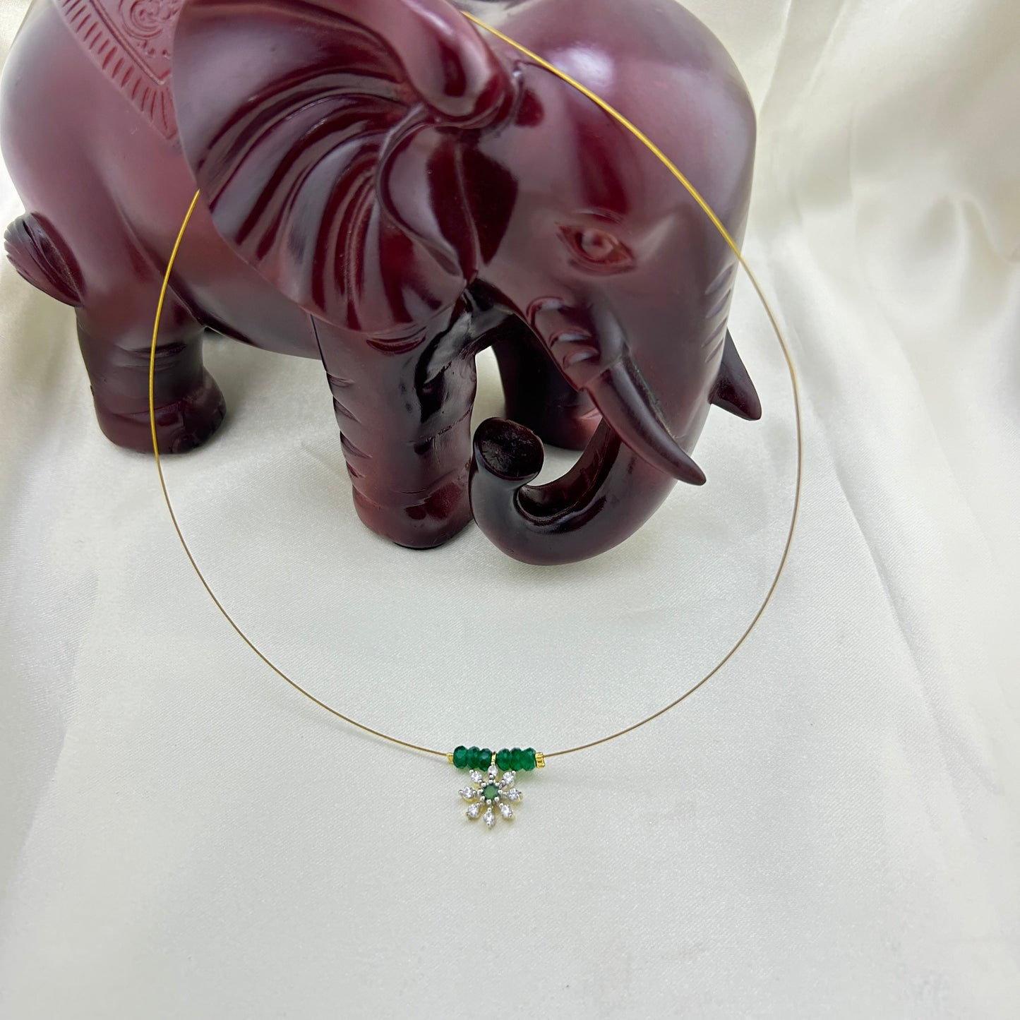 Flower pendant with green beads invisible chain