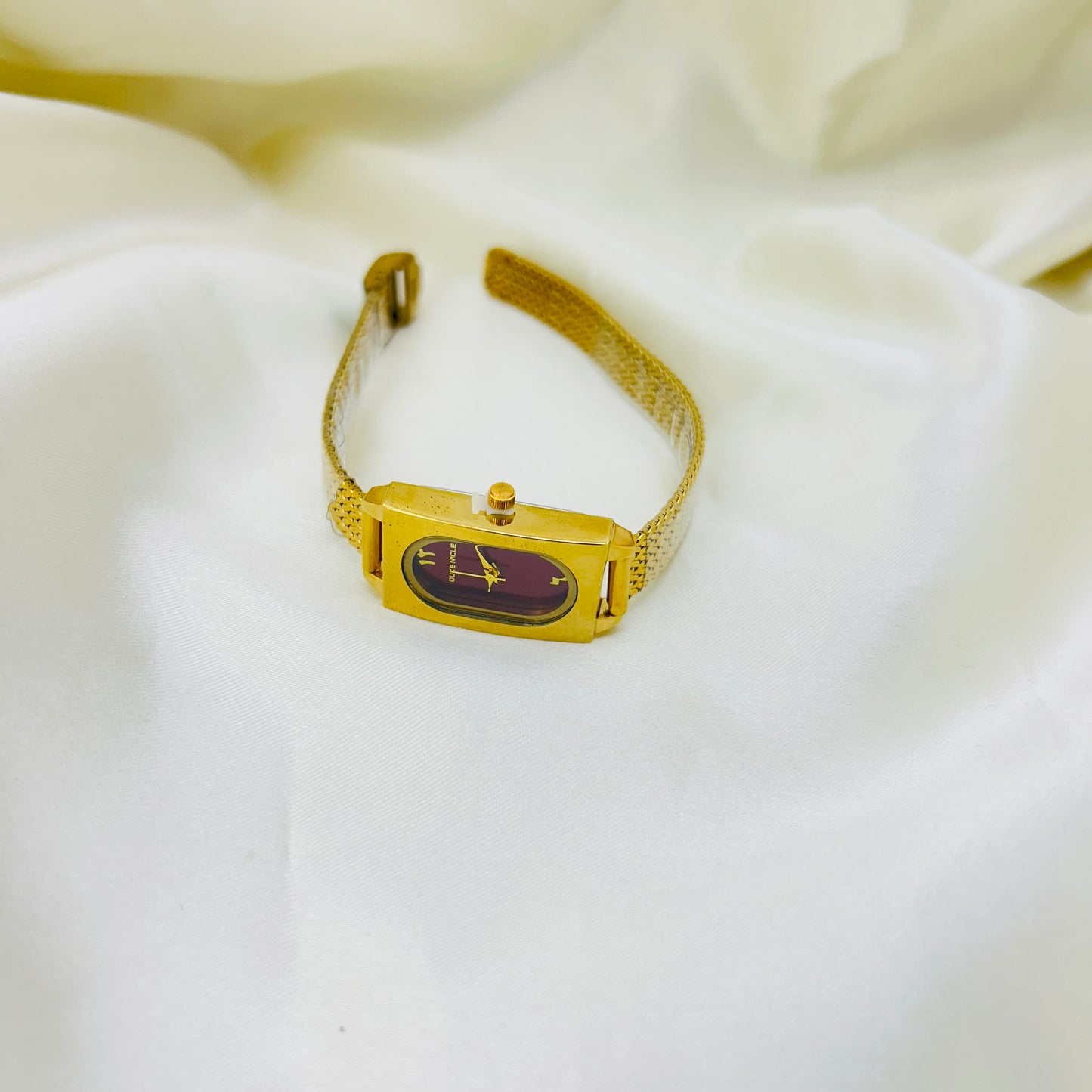 Ruby Oval Dial Gold Women's Watch