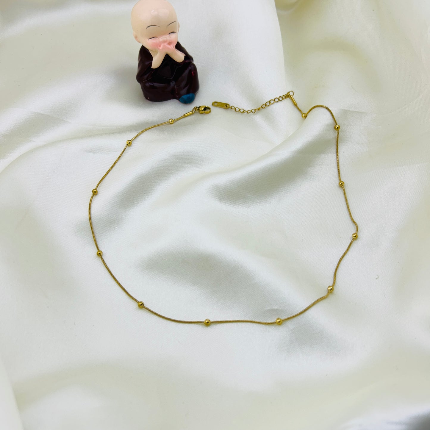 Single layer tiny golden beaded thin demifine necklace