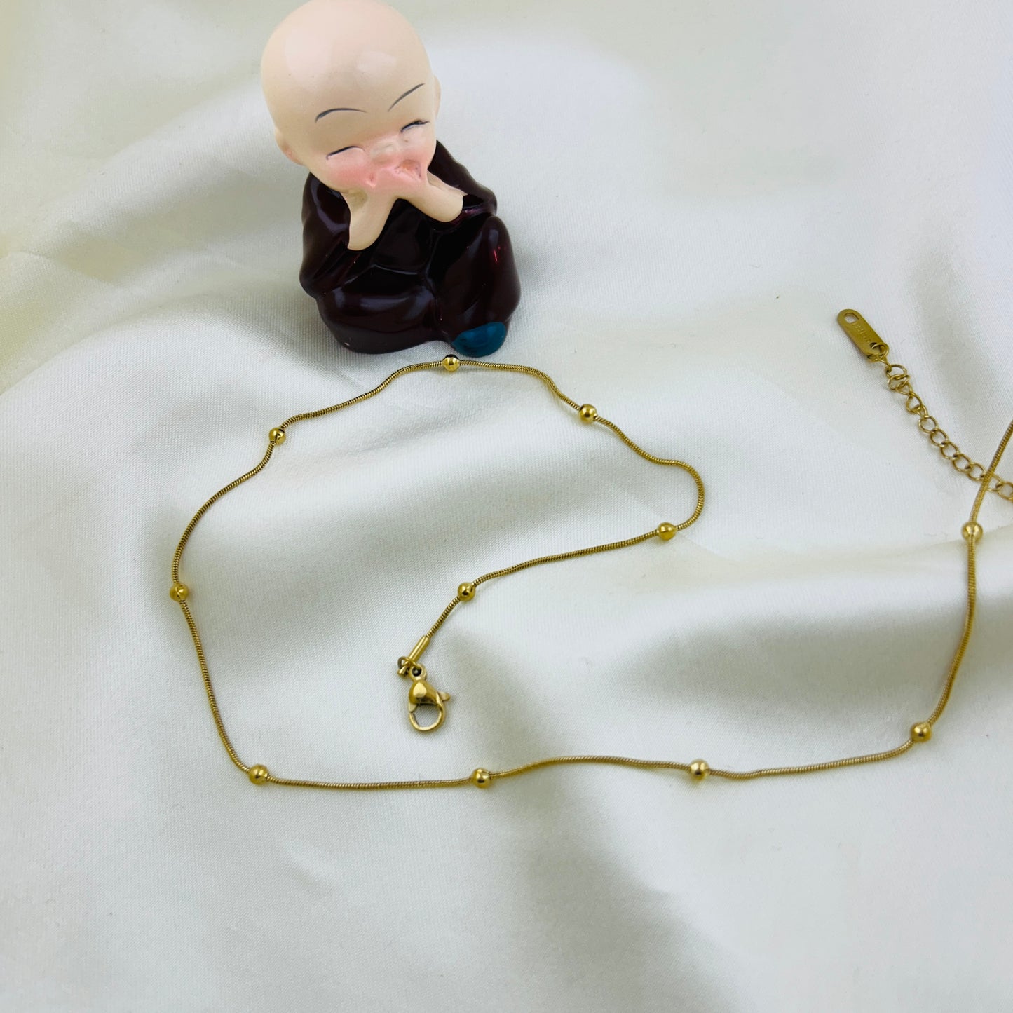 Single layer tiny golden beaded thin demifine necklace