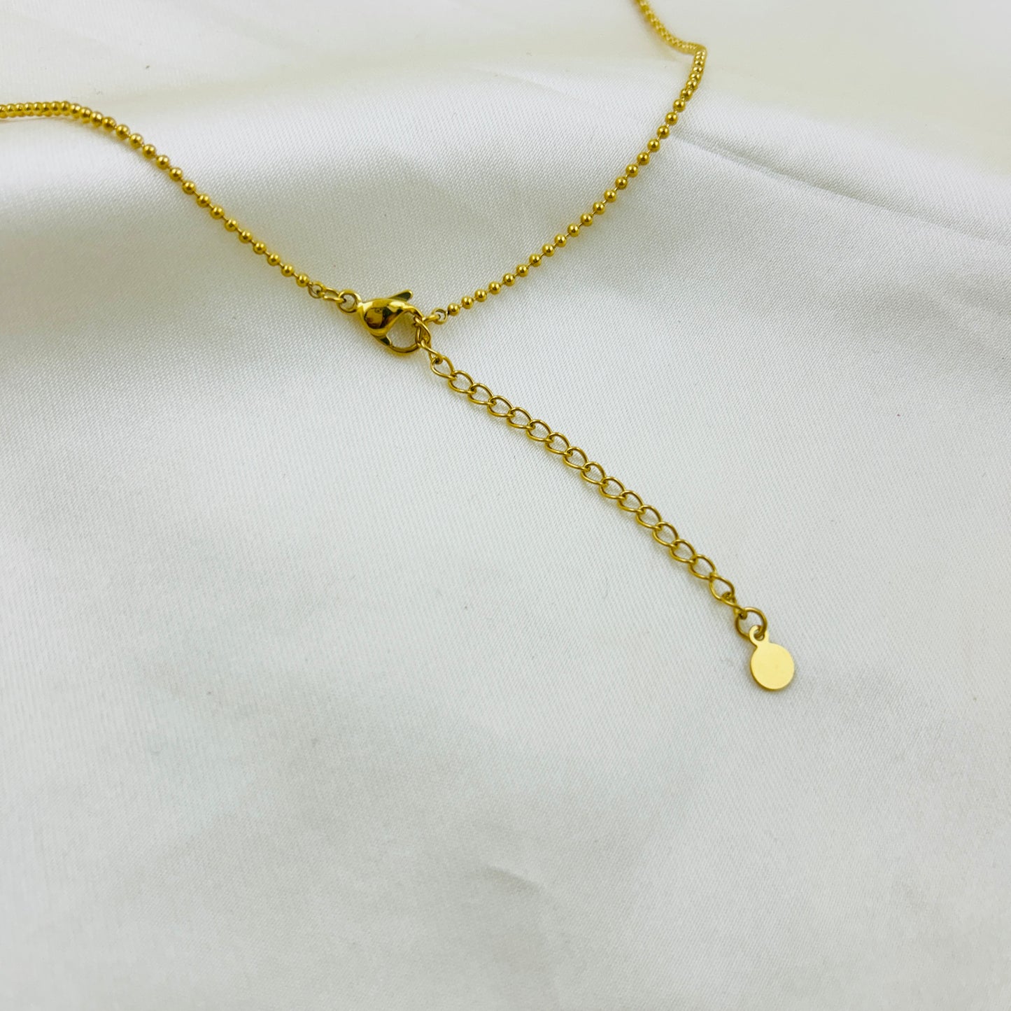 Tiny emerald green pendant with dotted chain demifine necklace