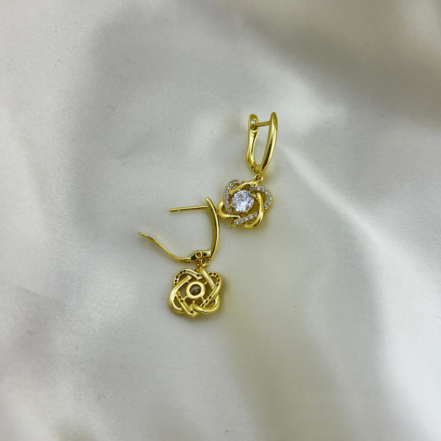 Twisted hearts, sparkling stone dangle hoops - zirconia cluster drop earrings