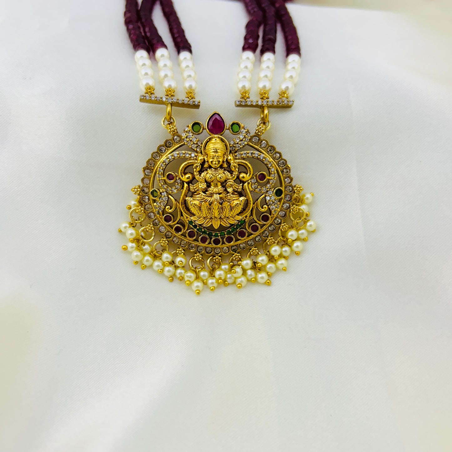 Maroon onyx beaded long haara with Lakshmi pendant