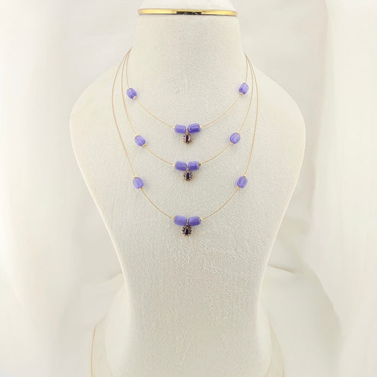 Three layered purple beaded invisible chain