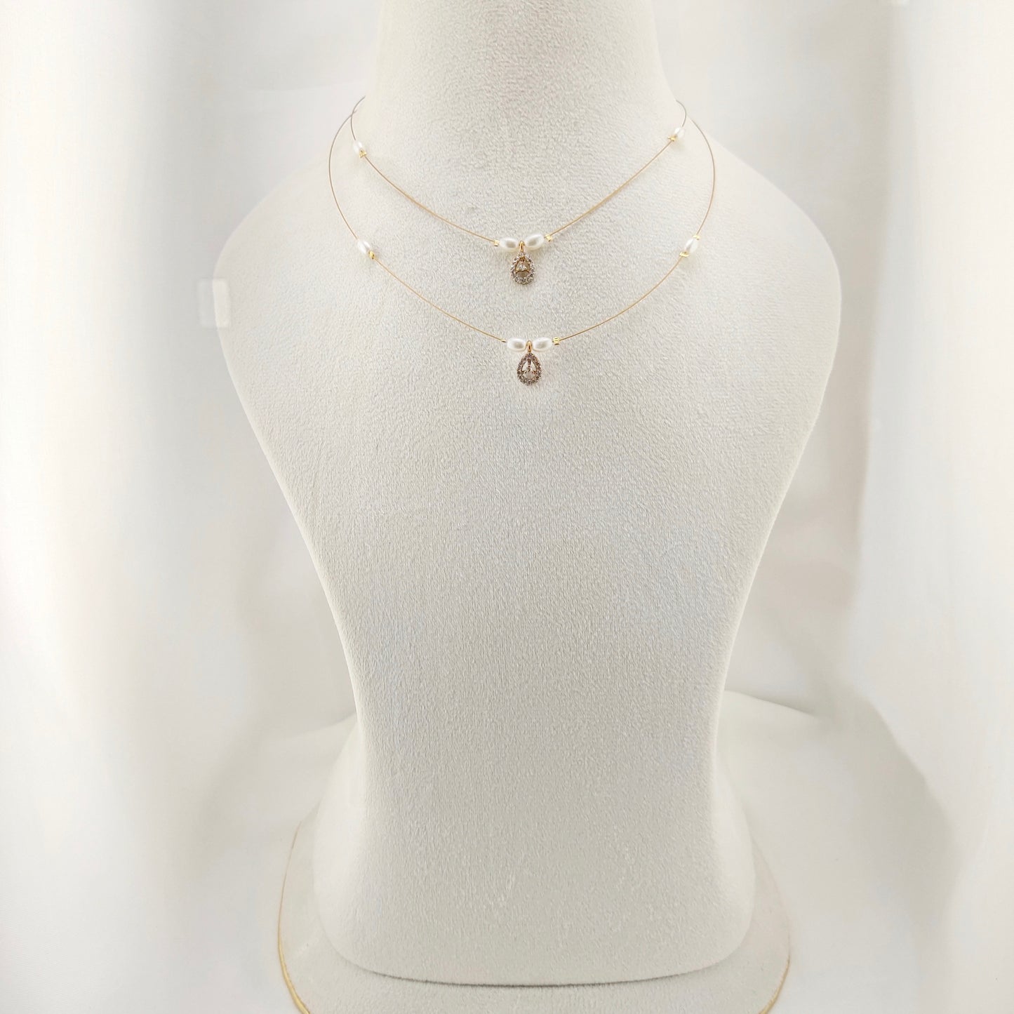 Drop shape pendants with pearls 2-layer invisible chain
