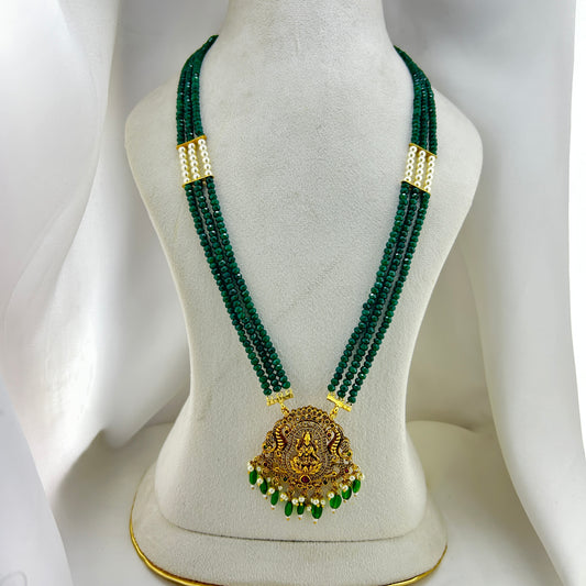 Long necklace with green semiprecious beads, pearls and Lakshmi pendant