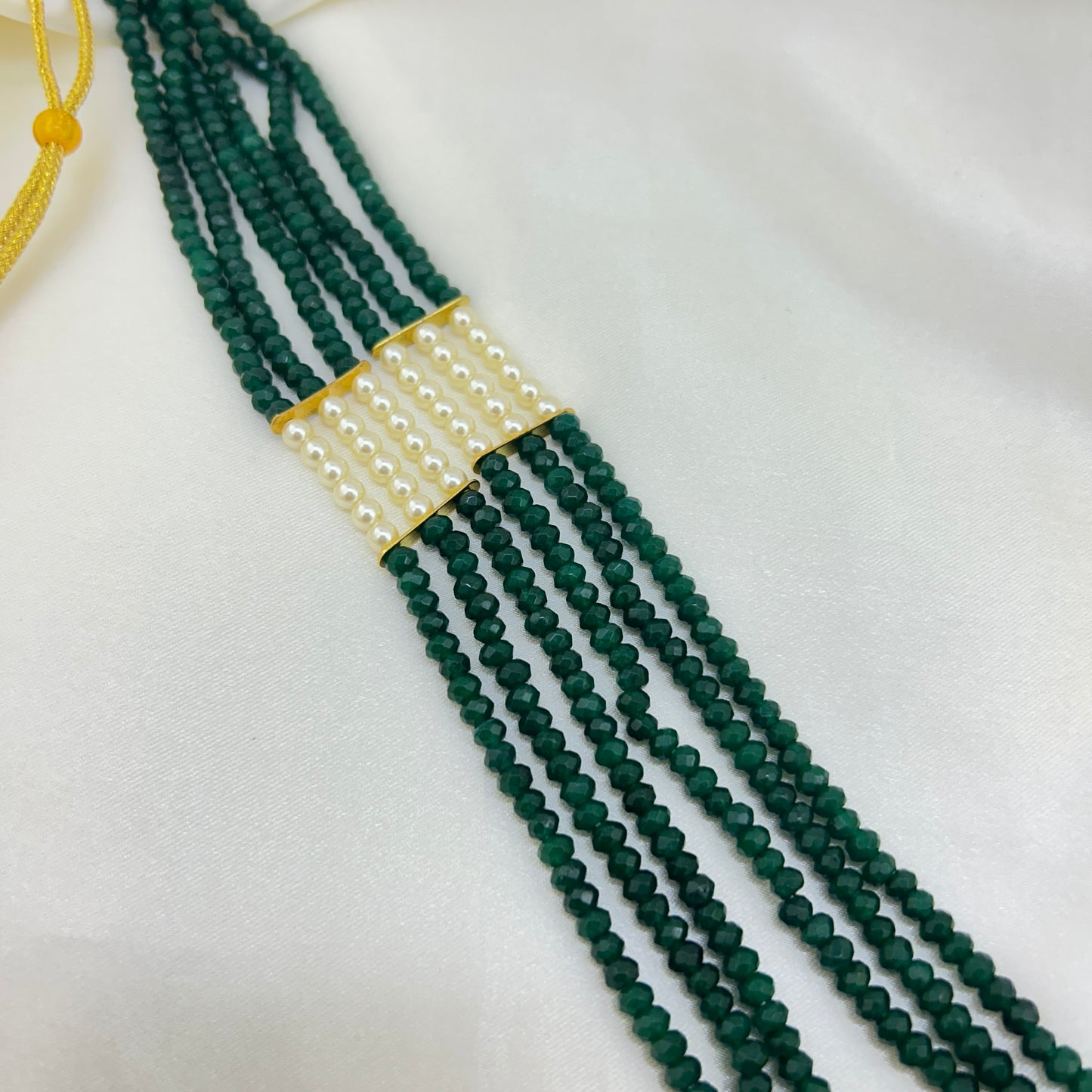 Long necklace with green semiprecious beads, pearls and Lakshmi pendant