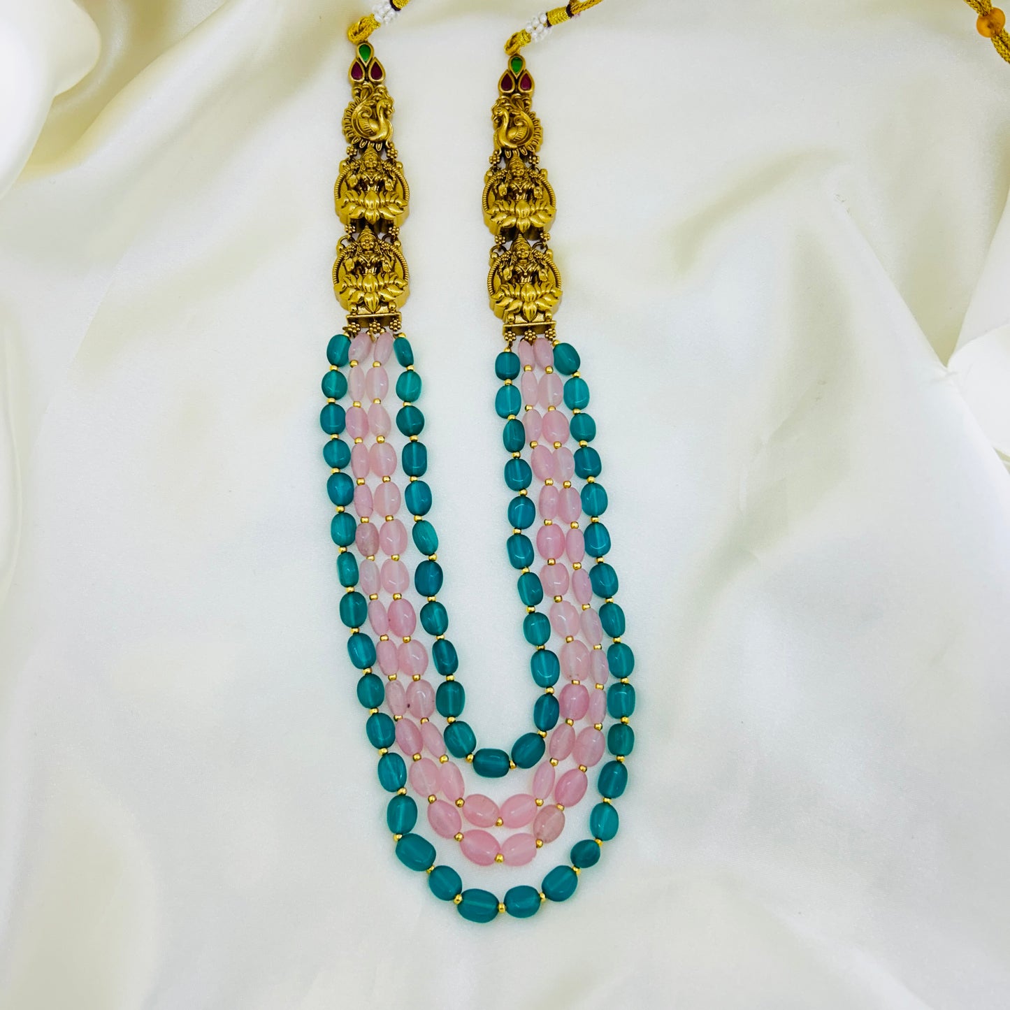 Necklace with blue and pink beads