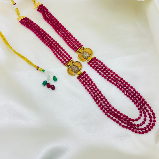 FOUR-LAYER RUBY HAARA – GANDABERUNDA PENDANTS