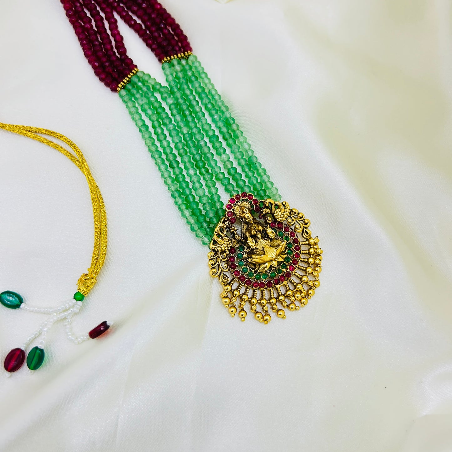 FOUR LAYER ONYX HAARA SET – PINK & SEA GREEN WITH LAKSHMI PENDANT