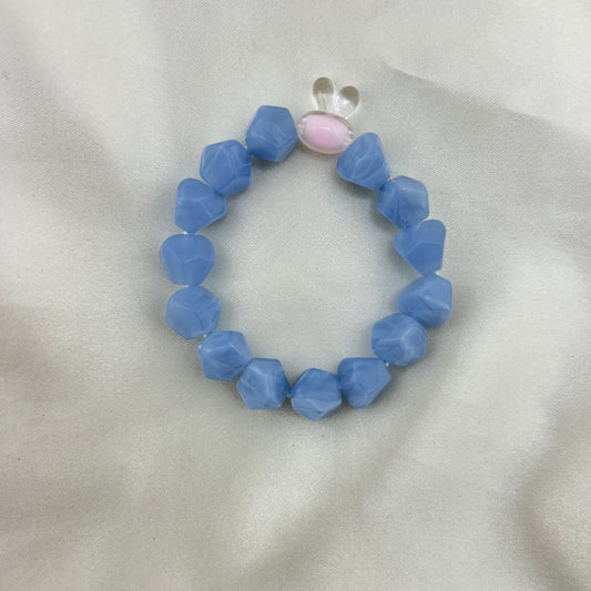 Blue beaded bracelet with a contrast bunny bead