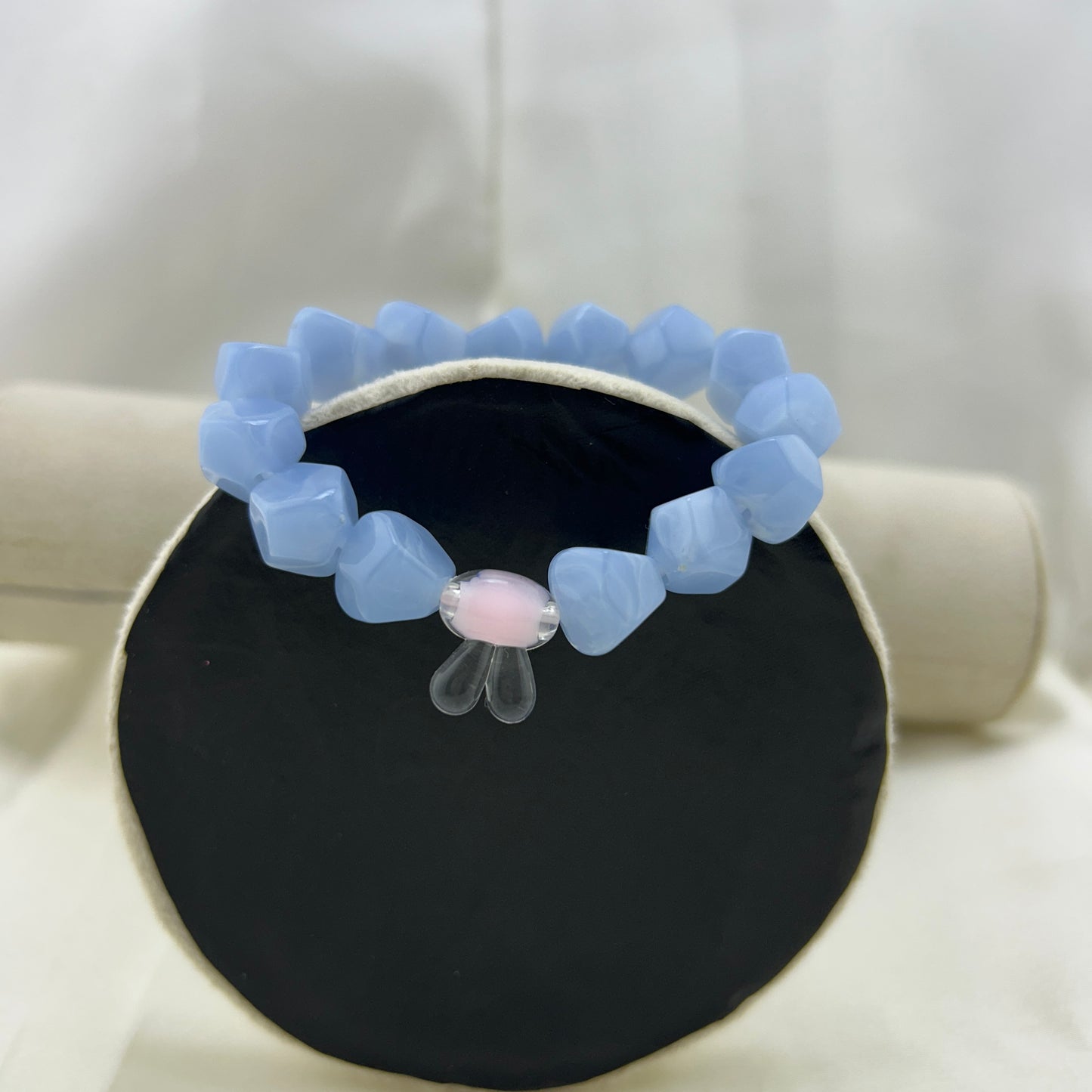 Blue beaded bracelet with a contrast bunny bead