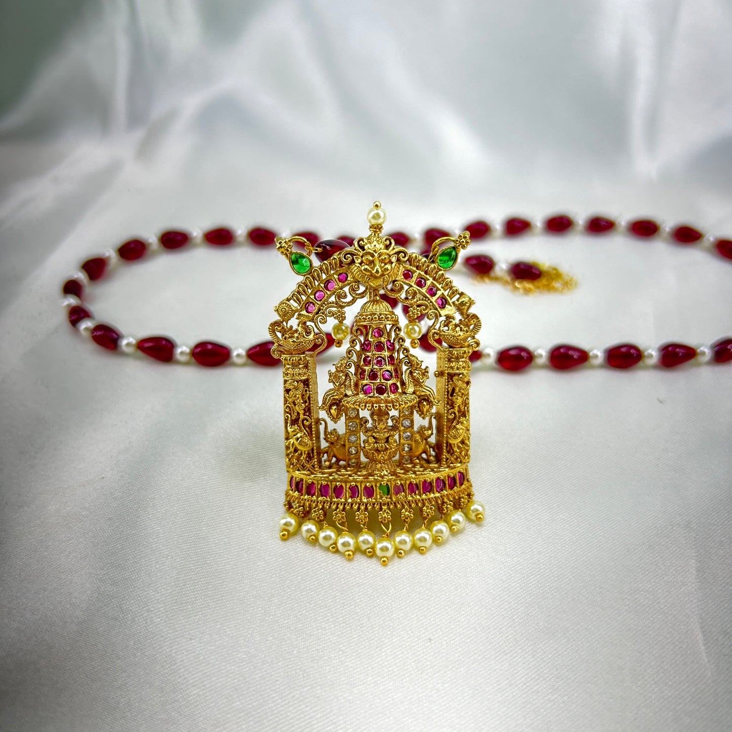 Pearl and maroon beaded Lakshmi long necklace with earrings