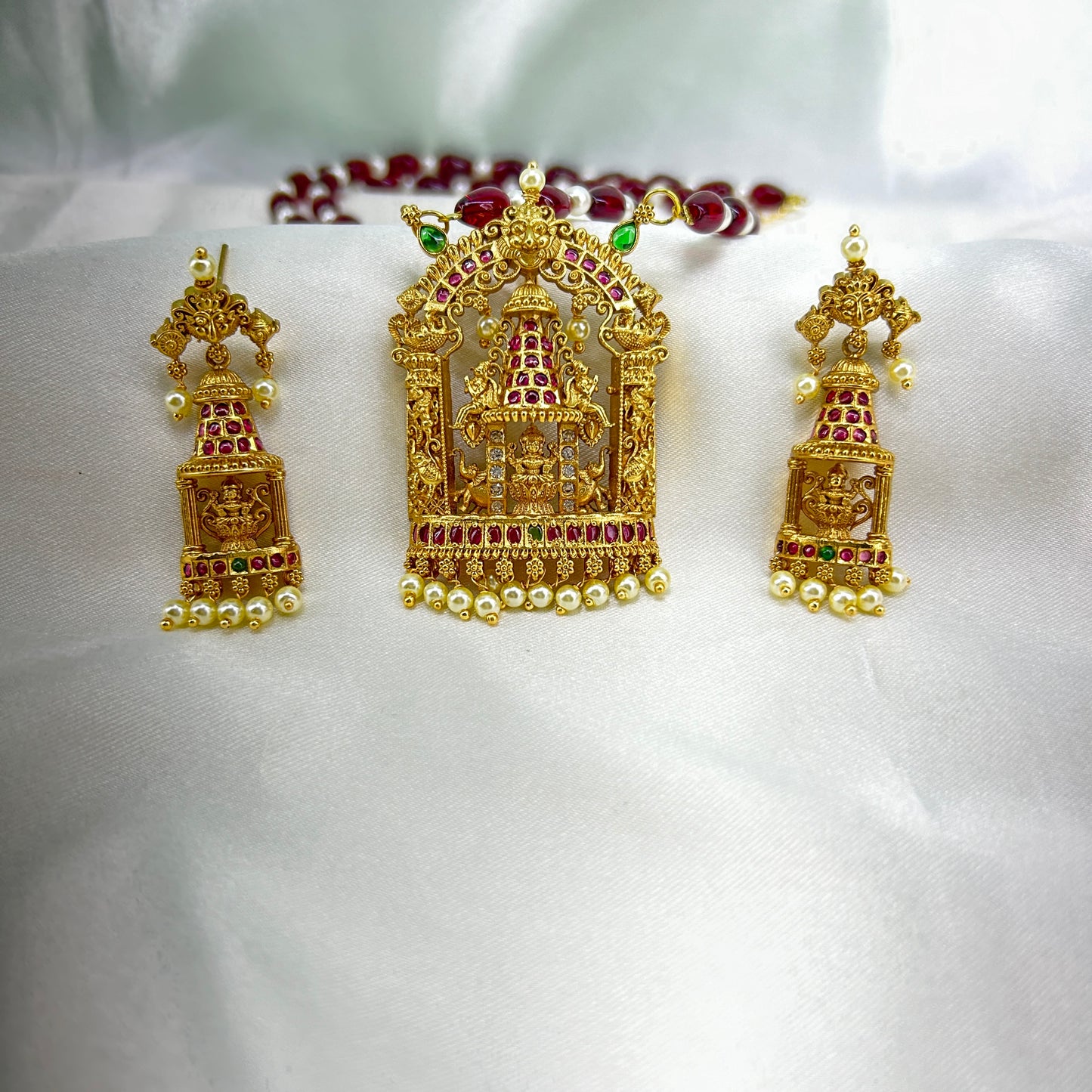 Pearl and maroon beaded Lakshmi long necklace with earrings