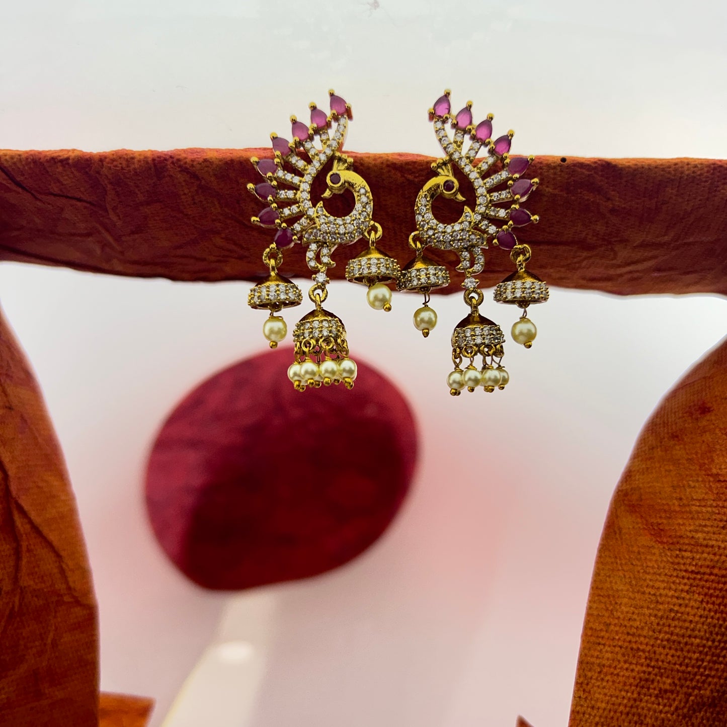 Peacock AD stone earrings with pearl jumkas