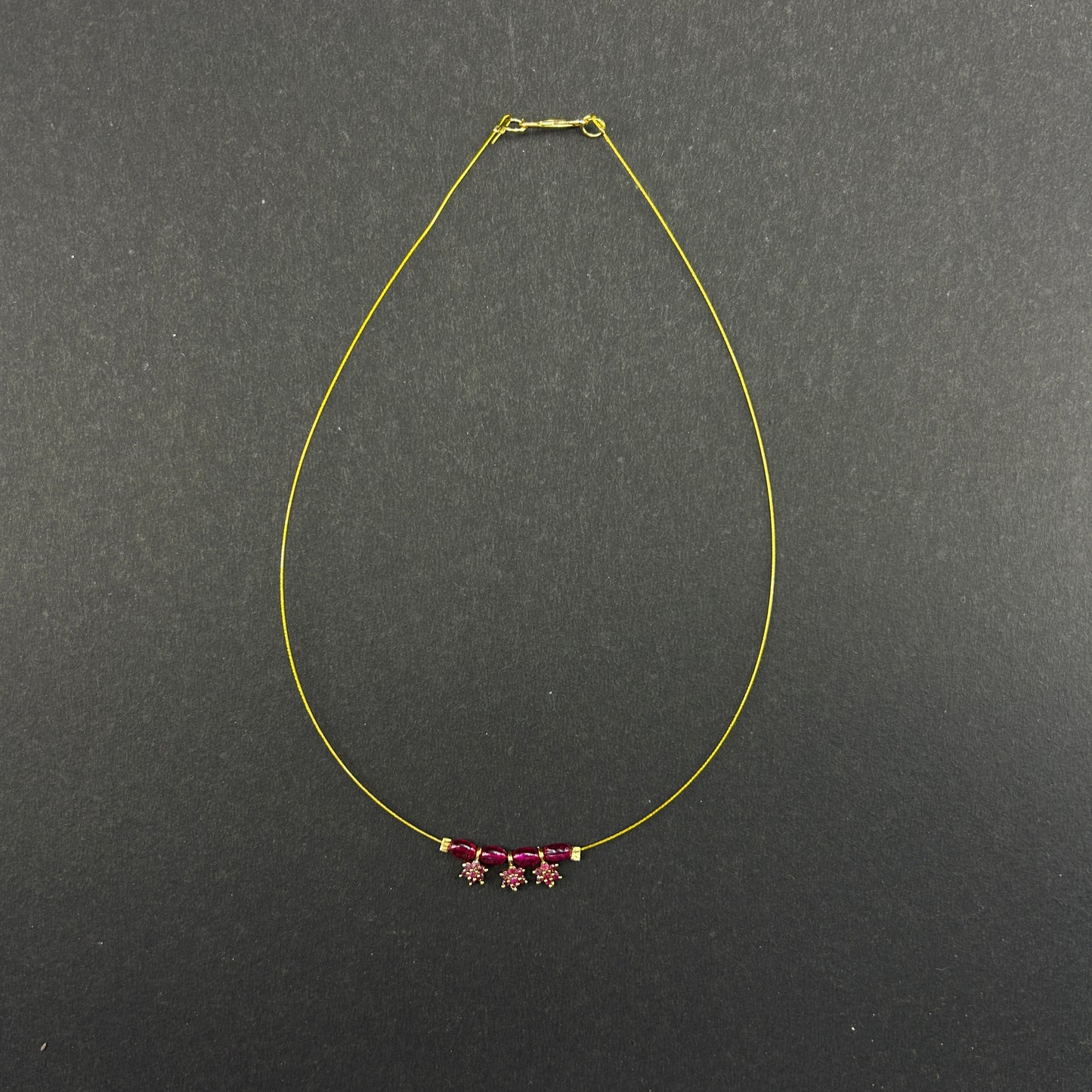 Pink stone flower pendants with ruby beaded invisible chain