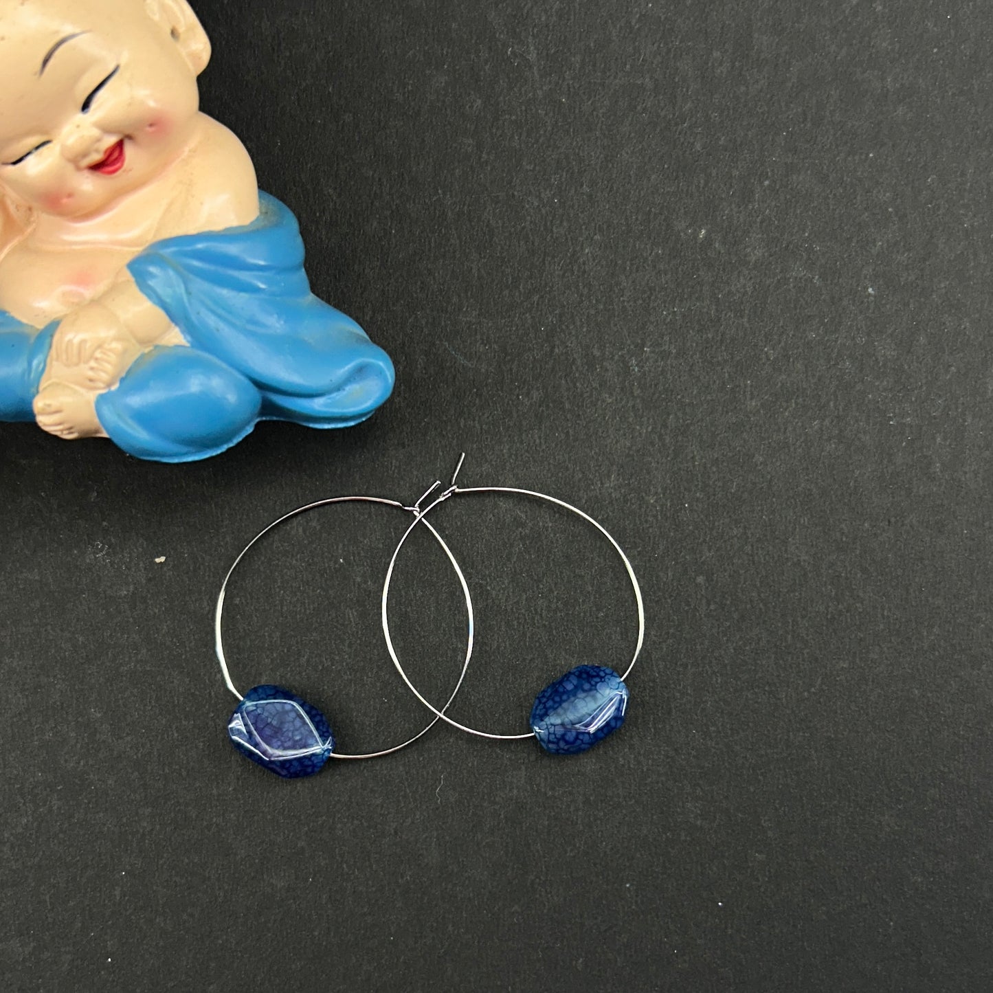 Round rings with blue crackeled stone