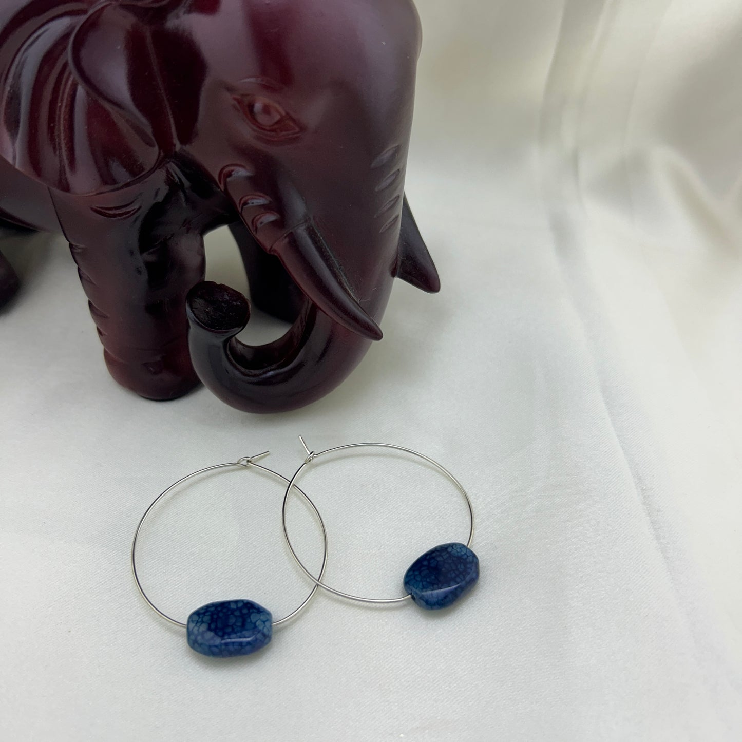 Round rings with blue crackeled stone