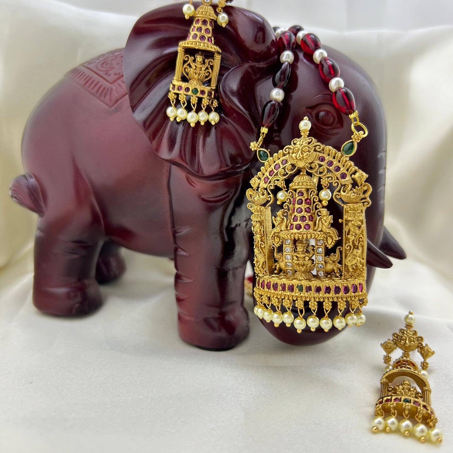 Pearl and maroon beaded Lakshmi long necklace with earrings