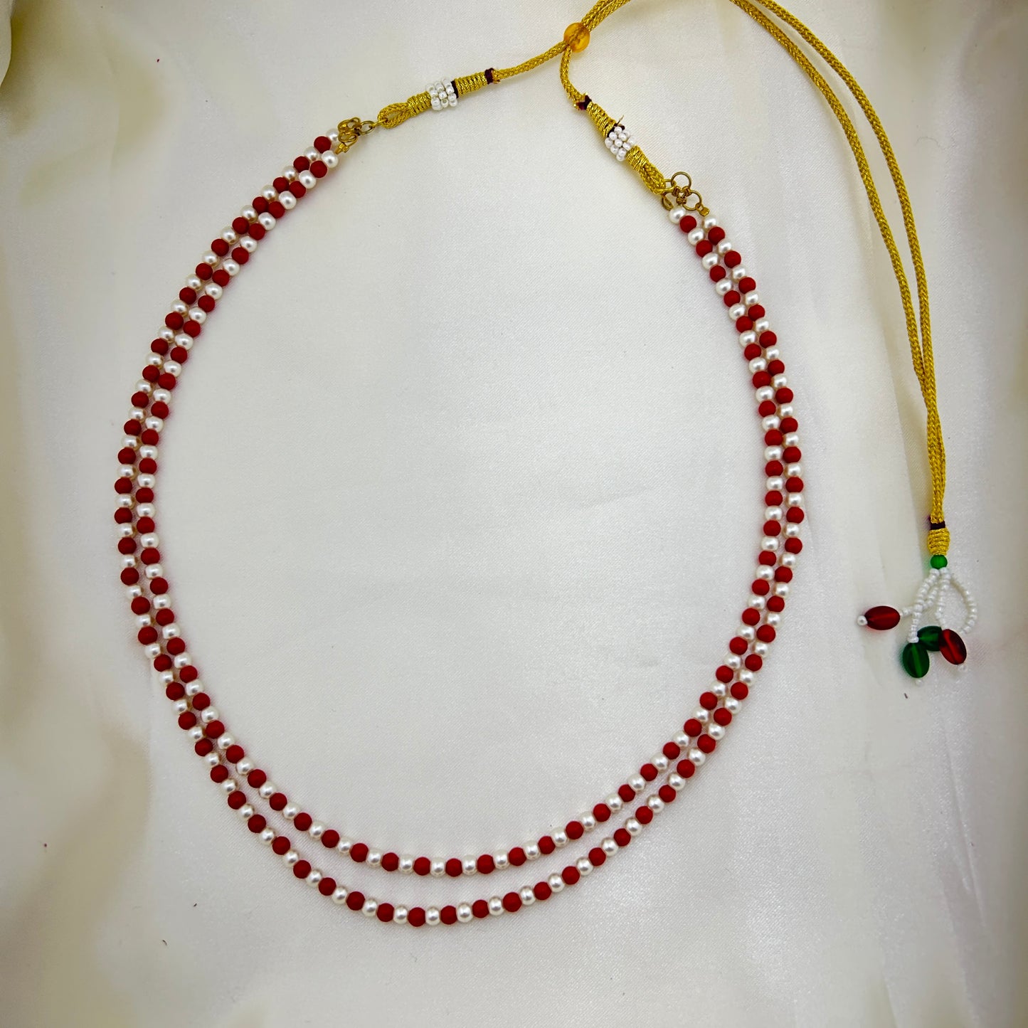 Two layered pearl and coral beaded necklace