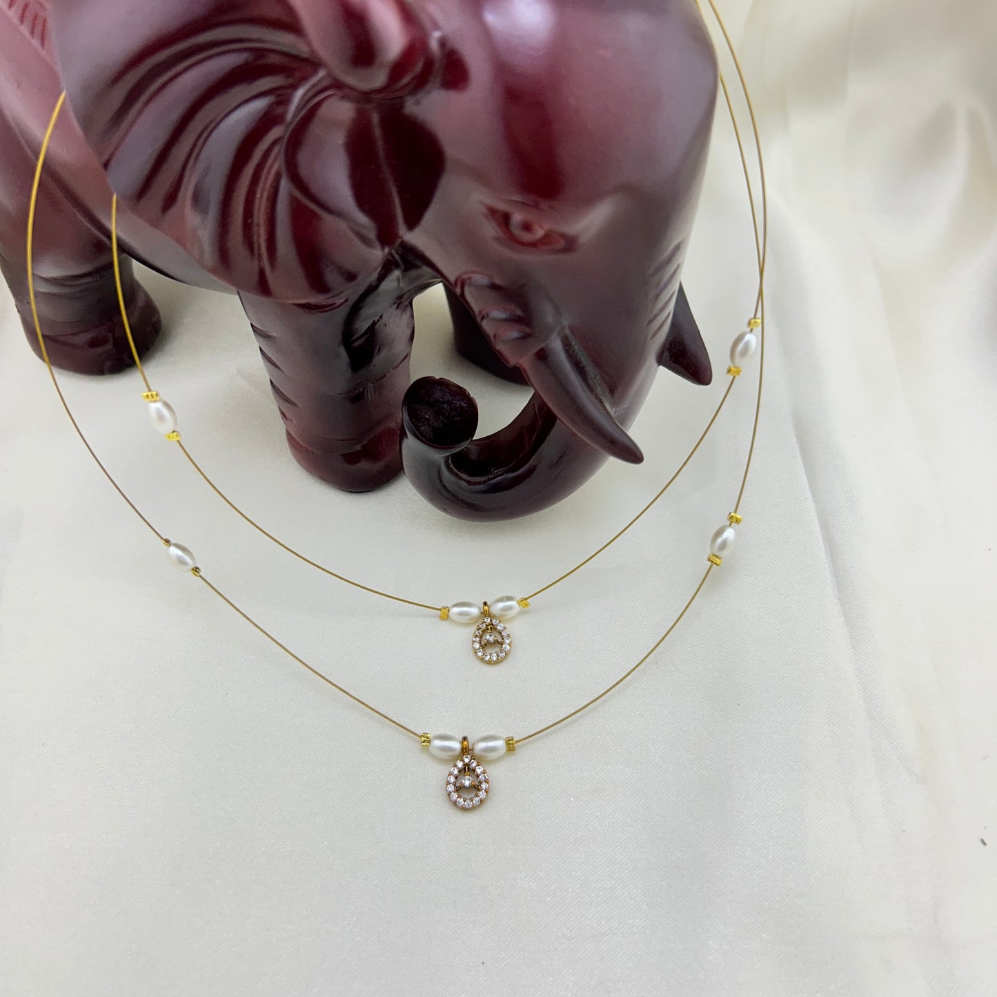 Drop shape pendants with pearls 2-layer invisible chain