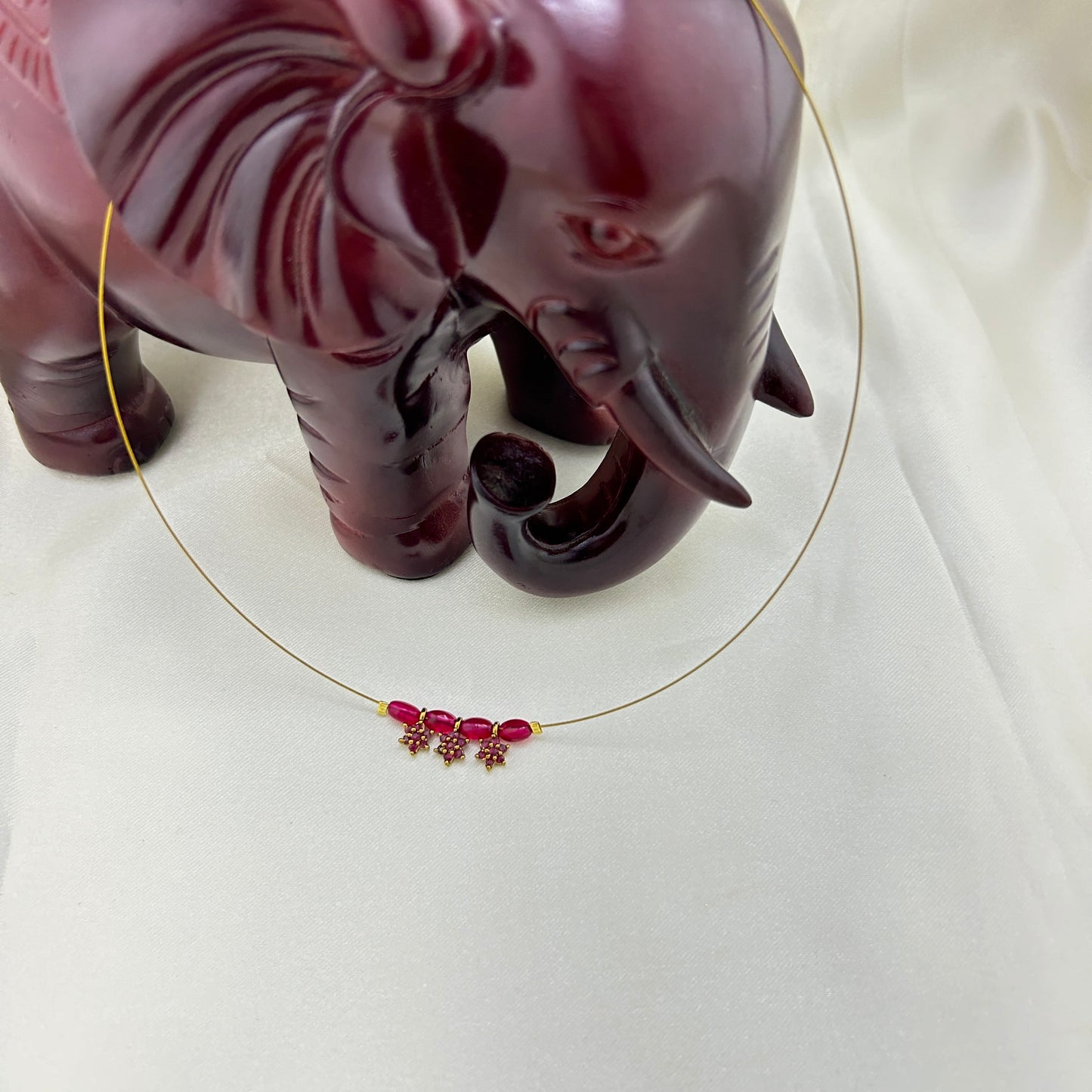 Pink stone flower pendants with ruby beaded invisible chain