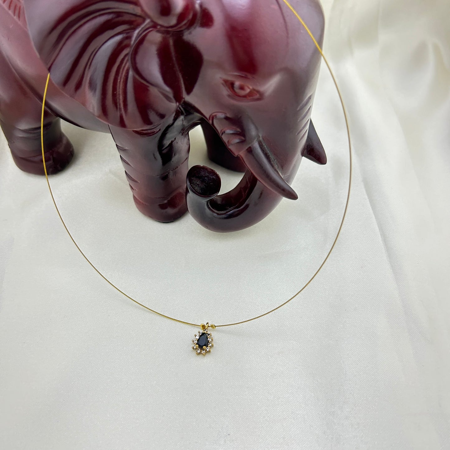 Black stone pendant invisible chain