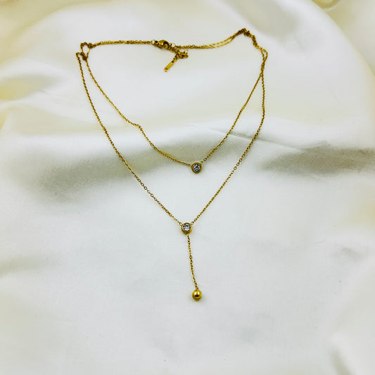Two layered round stone with a gold drop demifine necklace