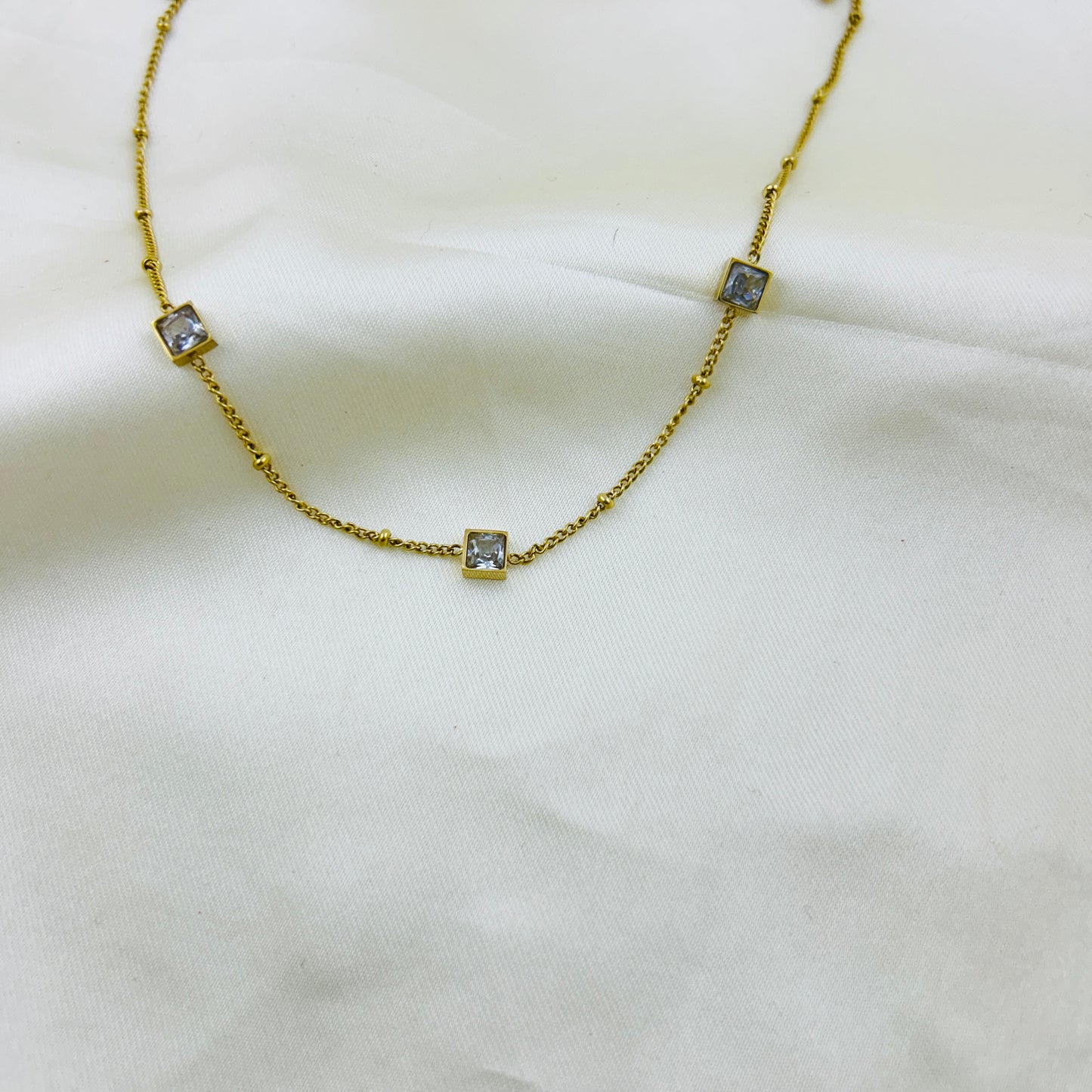 Three square lockets in a thin chain - demifine necklace