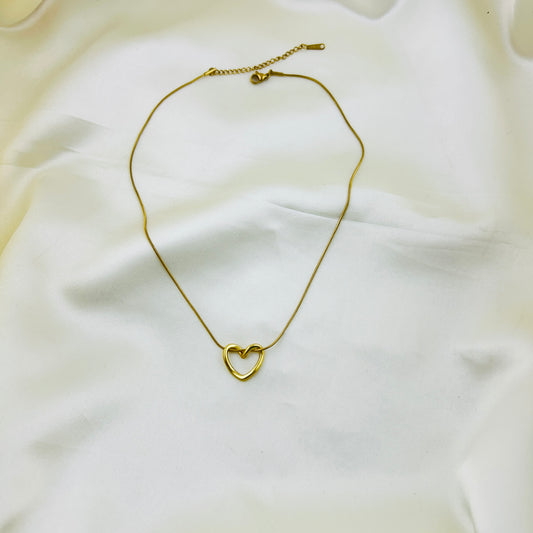 Minimalist twisted heart pendant in thin chain  - Demifine necklace