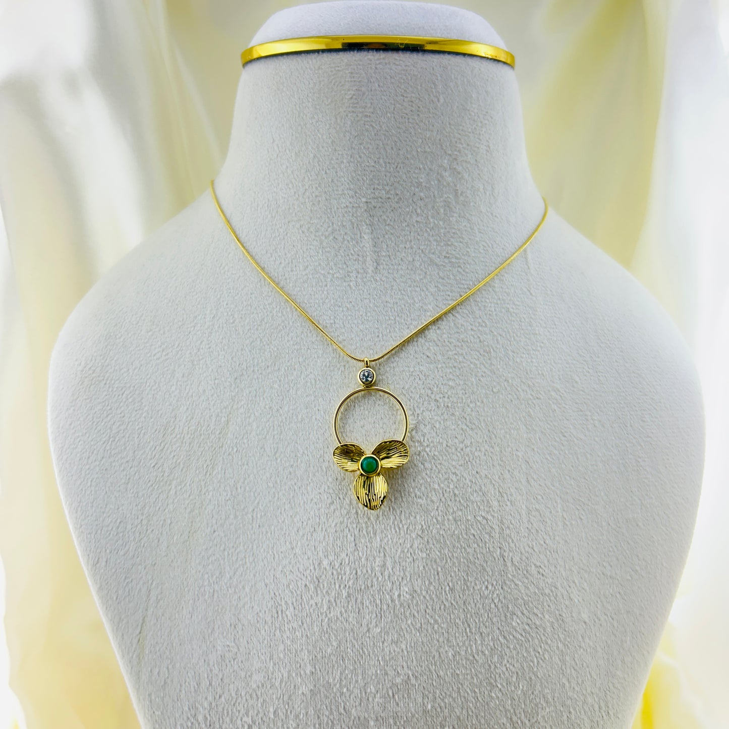 Three petal flower with a green stone at centre pendant demifine necklace