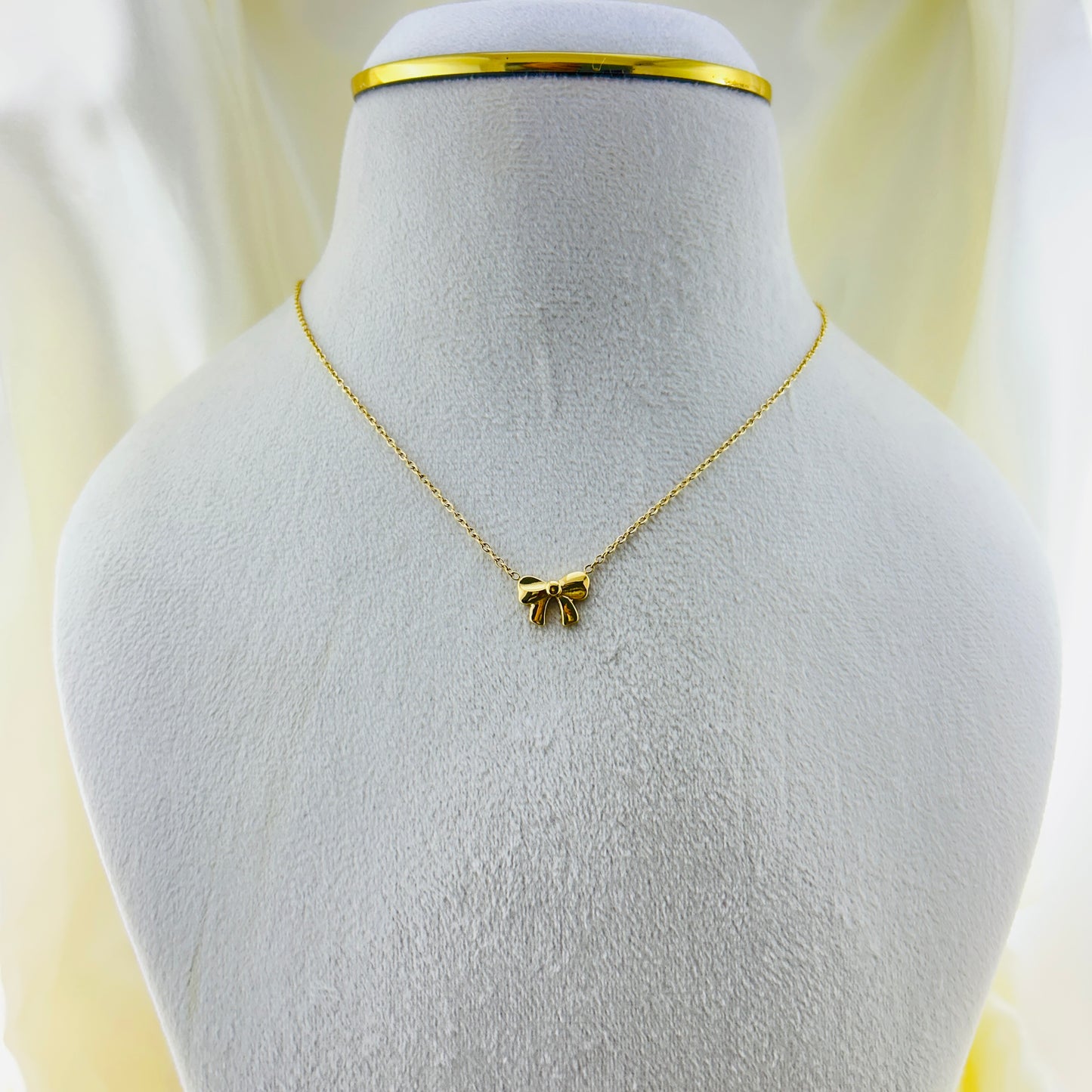 Minimal Golden Bow pendant with thin chain demifine necklace