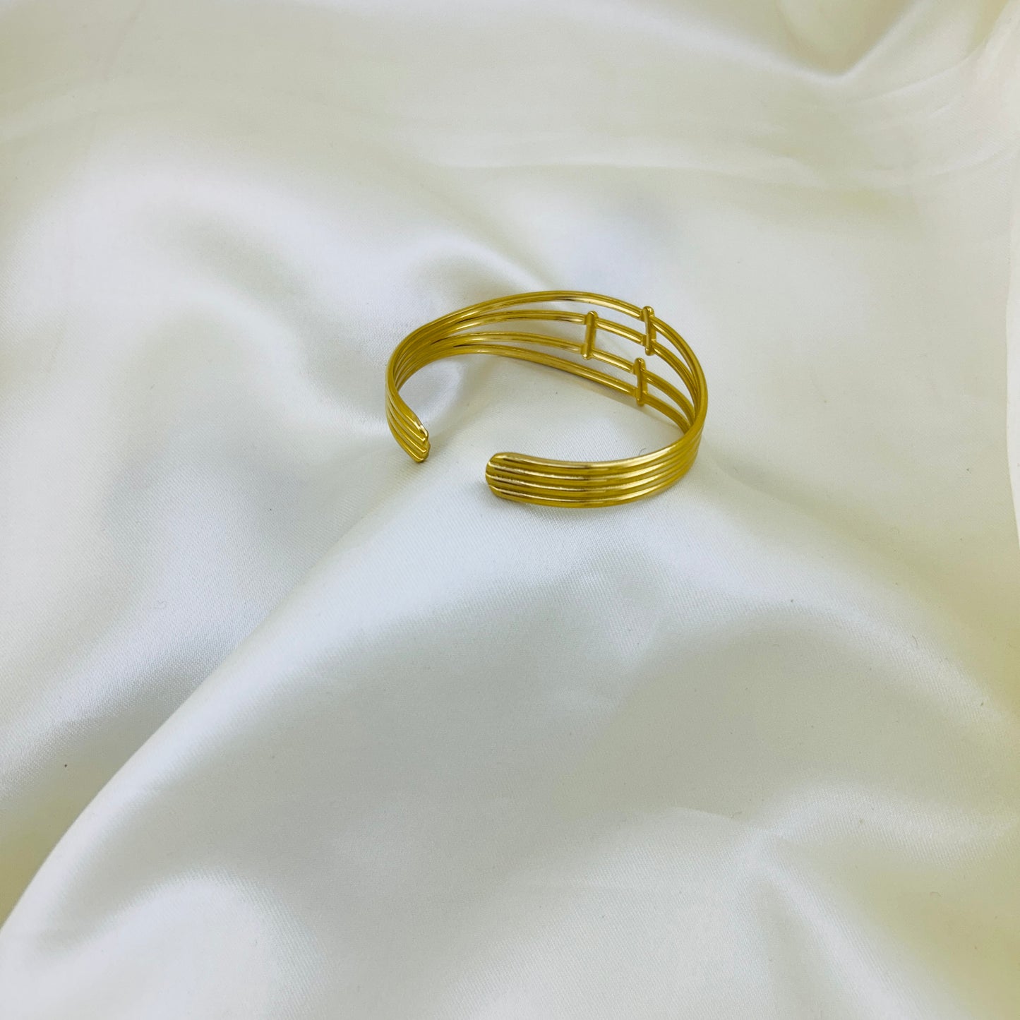 Four layer bridged golden cuff bracelet - kada