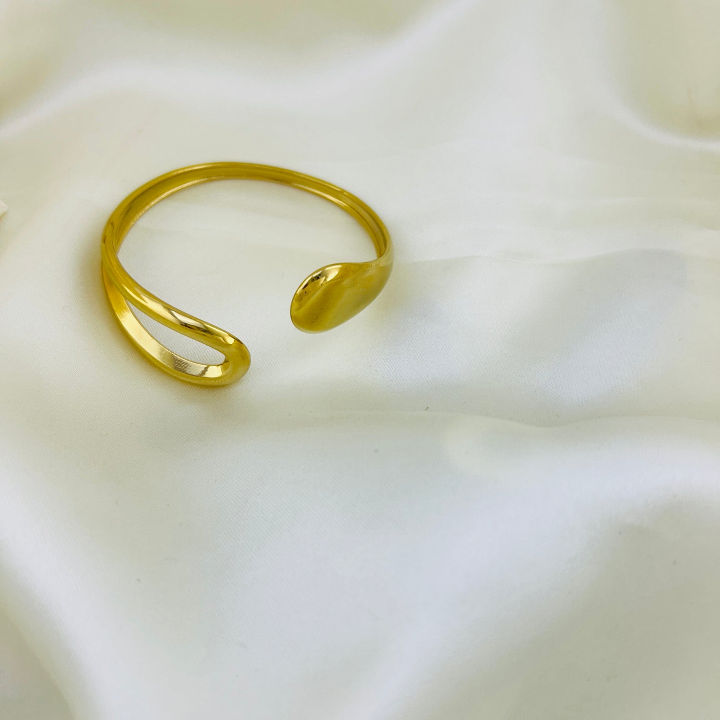 Adjustable golden cuff bracelet