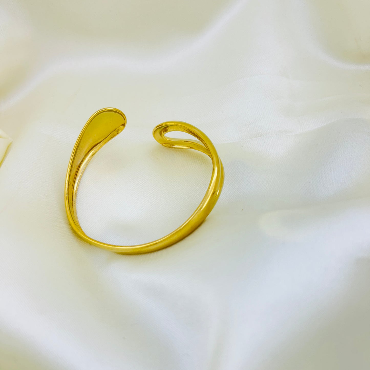 Adjustable golden cuff bracelet