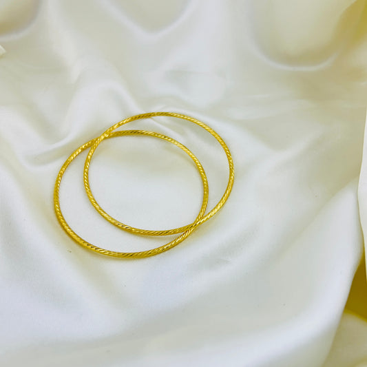 Simple and round golden bangles