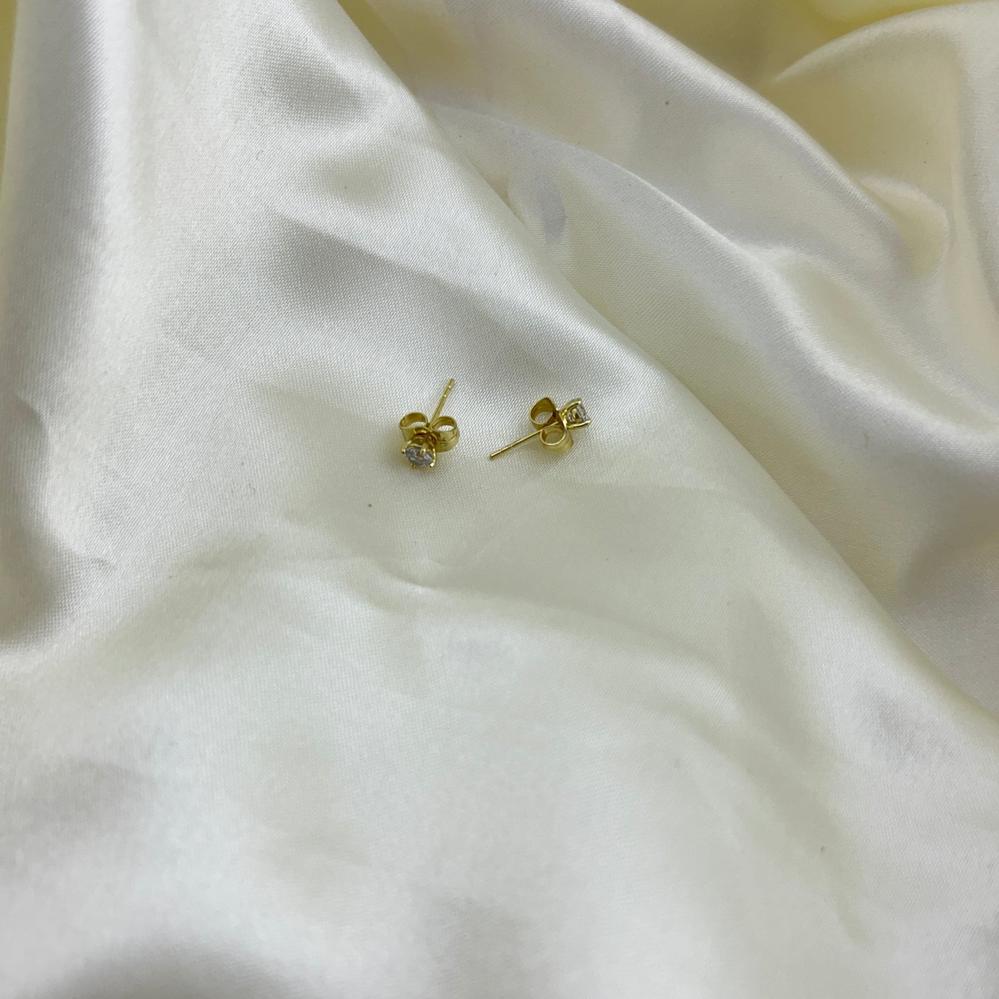 Tiny stone studs - earrings