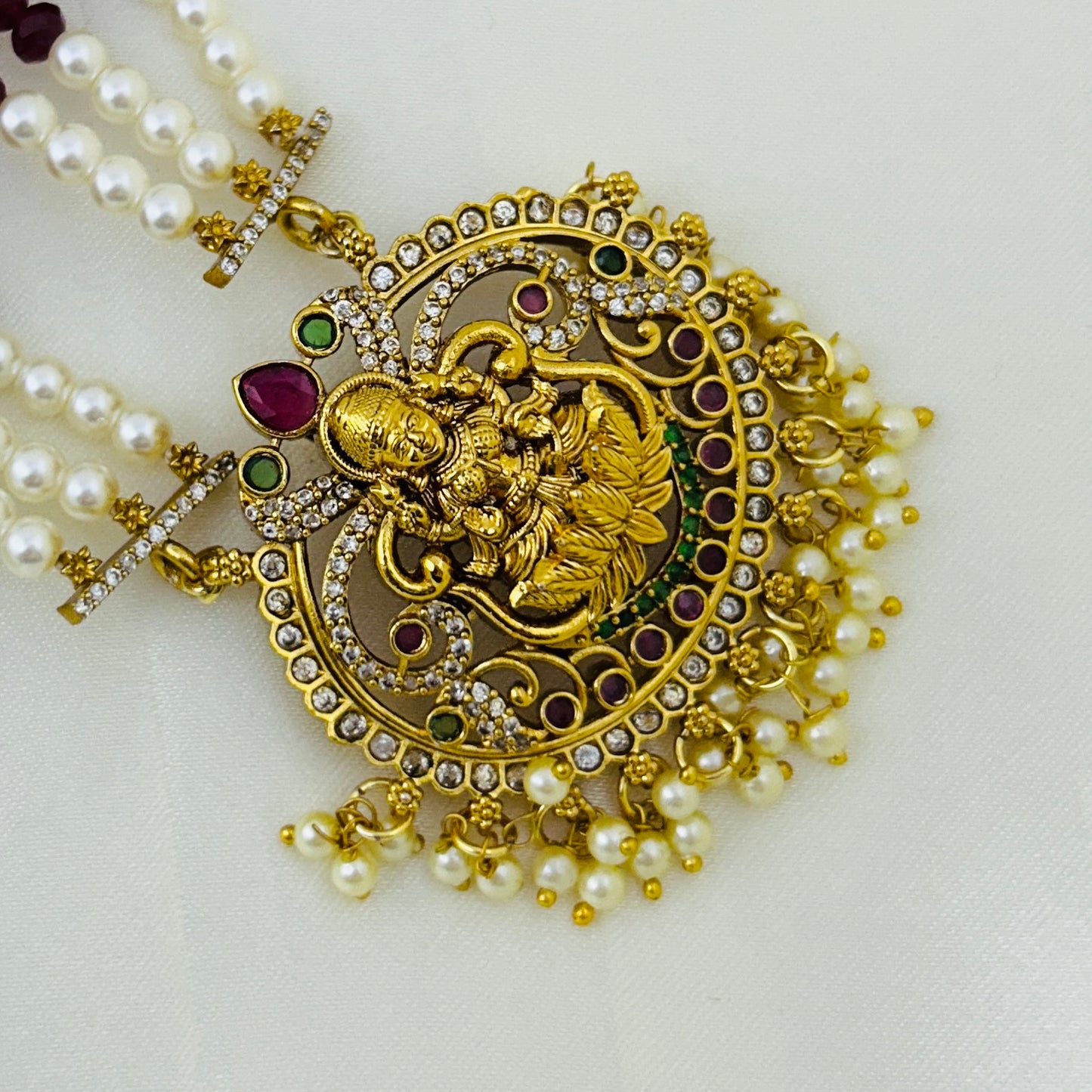 Maroon onyx beaded long haara with Lakshmi pendant